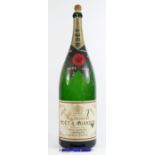 A 1955 oversized 'Balthazar' Moet et Chandon empty champagne bottle, standing 61cm tall.