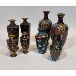 A Japanese pair of cloisonne baluster vases, 18cm, two other cloisonne vases and two pairs of