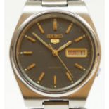 Seiko 5, a stainless steel day date black dial automatic gentleman's wristwatch, 7009-3130, original