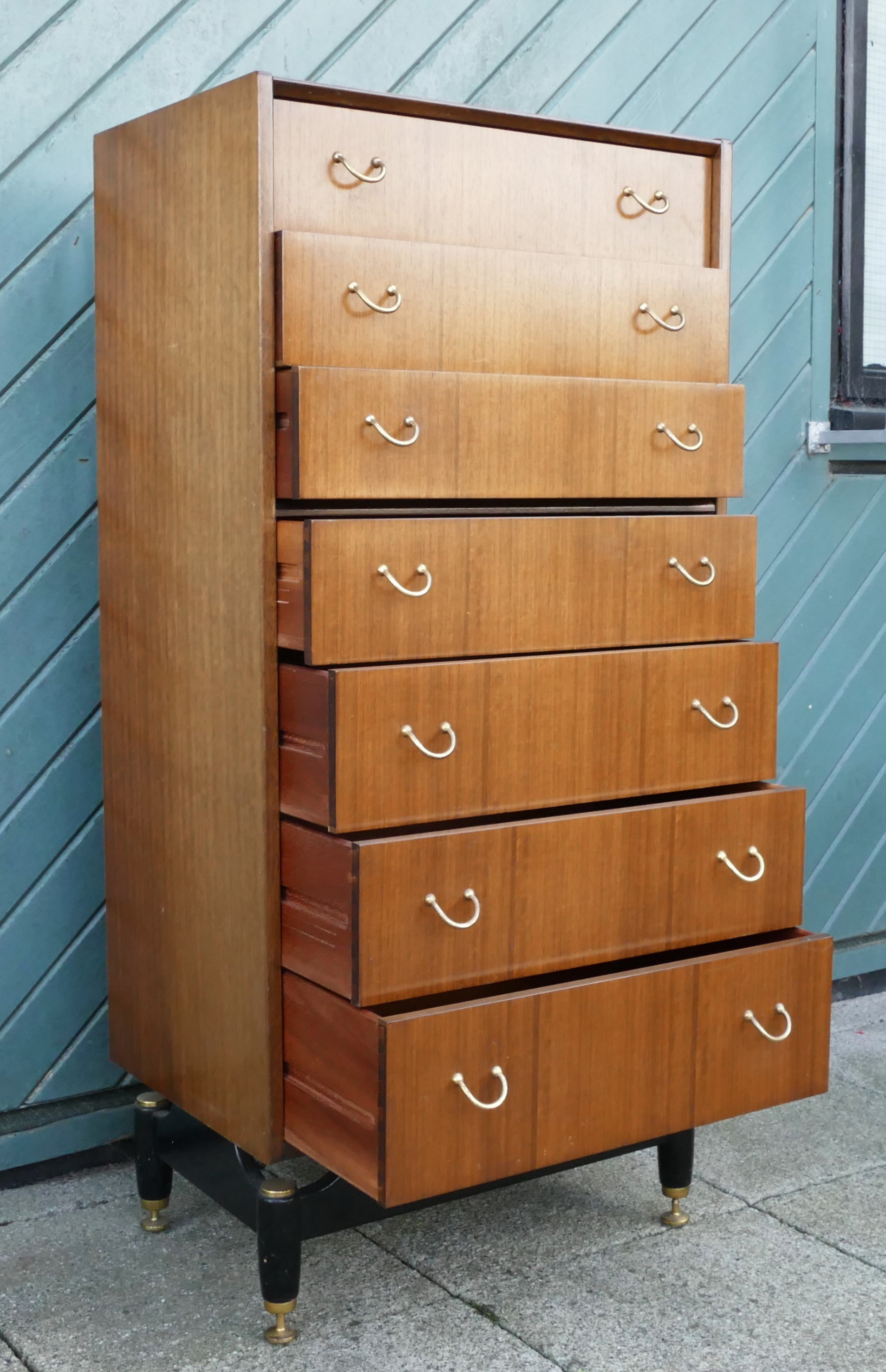 E.Gomme for G-Plan 1950s seven height narrow chest of drawers, each with brass ring handles united - Image 2 of 5