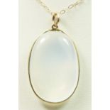 A gold spectacle mounted oval moonstone pendant, 24 x 16mm, chain