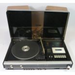 A 1970's Bush "Arena" HiFi system comprising of a turntable, cassette deck, radio, together with a