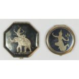 Two Siamese silver and enamel compacts, with Deity decoration, mirrors in both.