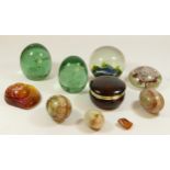 A collection of paper weights, to include two Victorian examples.