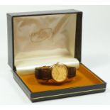 Longines, a gilt metal date quartz gentleman's wristwatch, leather strap, 33mm, box.