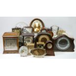 A collection of mid 20th century mantle clocks and wall clocks, having manual and quartz