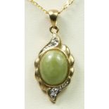 A 9ct gold, jade and diamond set pendant, chain, 2.9gm