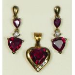 A 9ct gold mounted synthetic ruby and diamond heart shape pendant and a matching pair of ear