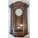 Hermle, a mahogany cased striking and chiming wall clock with strike/silent lever, pendulum