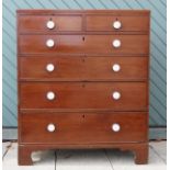 A Victorian mahogany 4+2 height chest of drawers with porcelain knobs, standing on bracket feet - H: