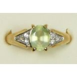 A 9ct gold pale green gemstone set ring, N, 2.8gm