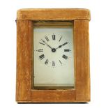 An early 20th Century 8 day carriage clock, brass cased, with bevel edged glass panels, complete