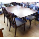 G-Plan drop leaf dining table, gateleg action, together with a set of four matching dining chairs