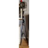 A Strand Electric, photographic studio lamp on collapsible tripod stand.