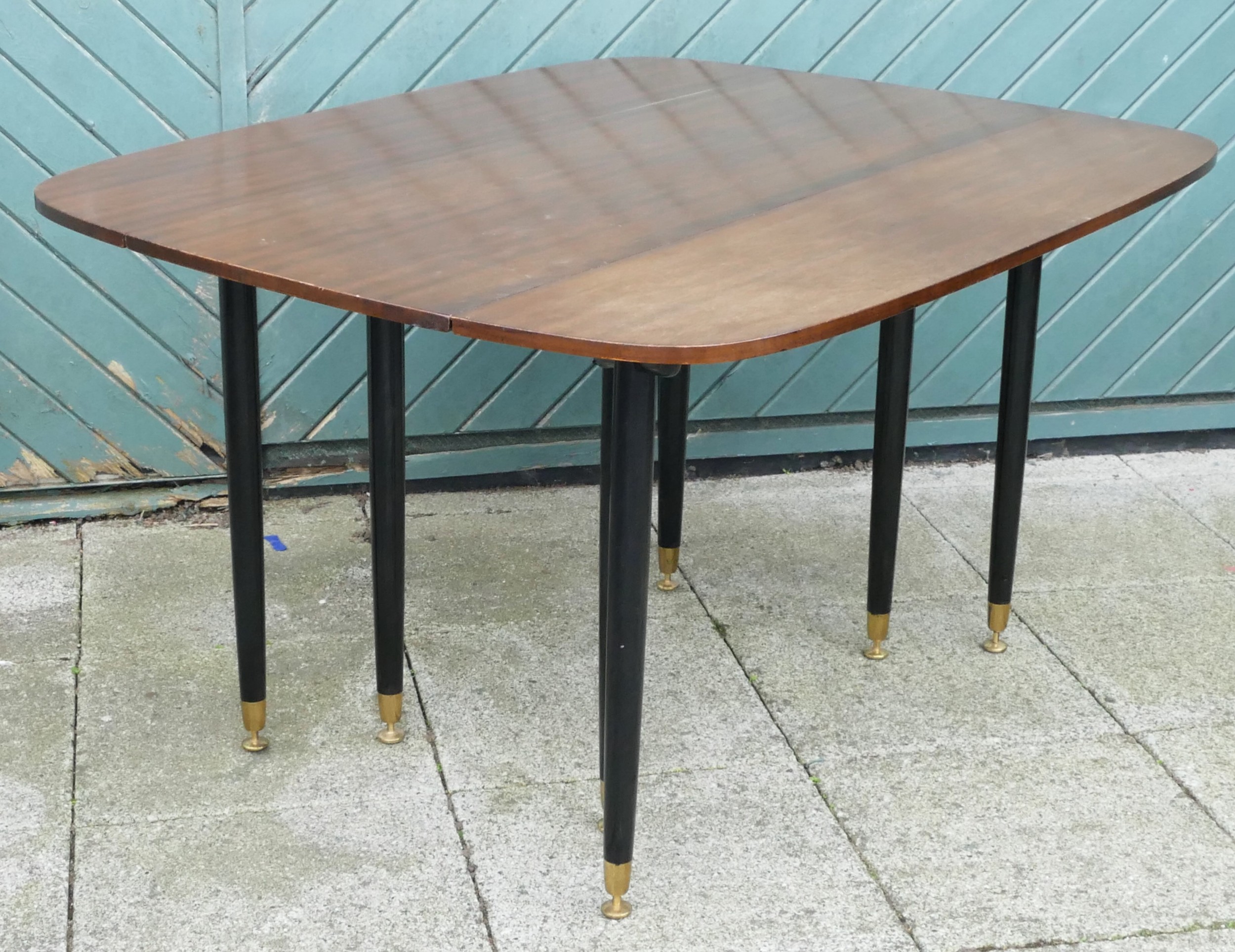 E.Gomme for G-Plan 1950s Librenza tola wood drop leaf dining table with gateleg action, ebonised - Image 4 of 11
