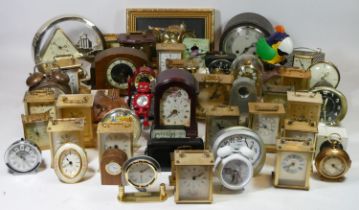 Four boxes of mid 20th century mantel clocks, having manual wind and quartz movements. (4)