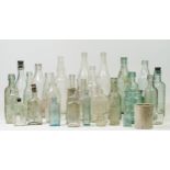 A collection of 19th Century and later bottles, to include pop, beer and chemist related.