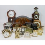 A collection of mid 20th century clocks, to include wall clocks, lantern and anniversary clocks by