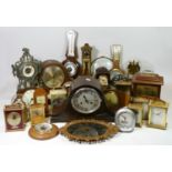 A collection of carriage clocks, anniversary clocks and an Atlas wall clock, having manual &