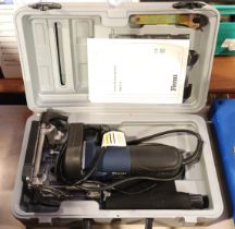 A "Ferm" electrical biscuit jointer - FBJ-710 in fitted case.