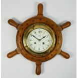 A German 'Schatz Midi Mariner' brass bulkhead clock, having 8 day jewelled movement striking to