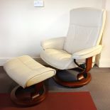 Ekornes, a Norwegian cream leather swivel recliner armchair, with matching footstool. (2)