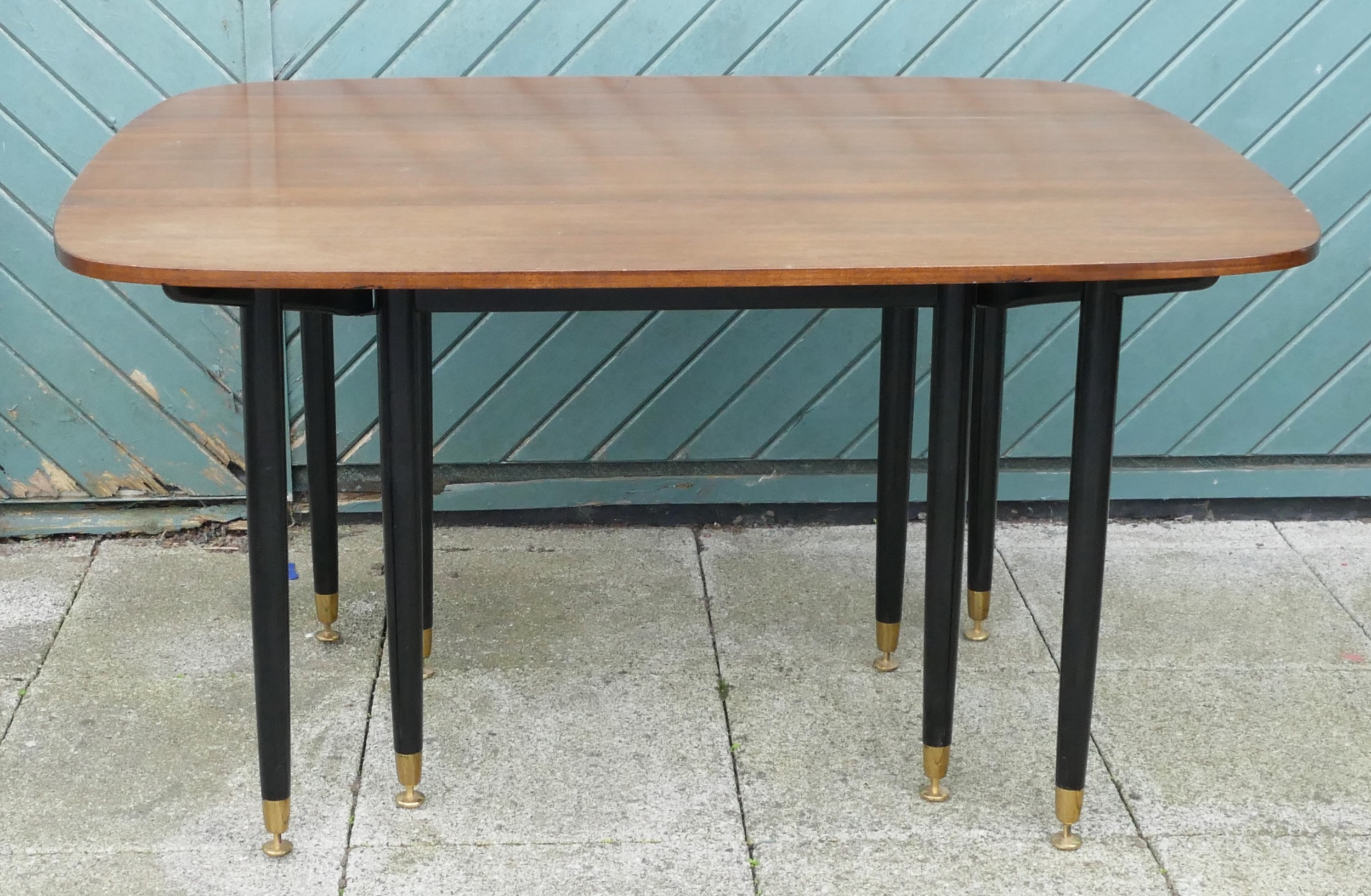 E.Gomme for G-Plan 1950s Librenza tola wood drop leaf dining table with gateleg action, ebonised - Image 3 of 11