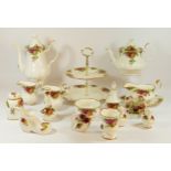 A fifty piece dinner/tea service by Royal Albert "Country Rose" pattern, comprising of six dinner