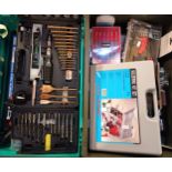 A collection of tools and accessories to include socket sets, Bosch drill set, soldering kit, comb
