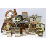 A collection of mantle clocks, barometers and a ships wall clock, makers to include - Swiza, Smiths,