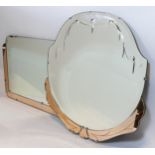 Two Art Deco wall mirrors, bevel edge with silvered decoration to the top and peach glass inserts to