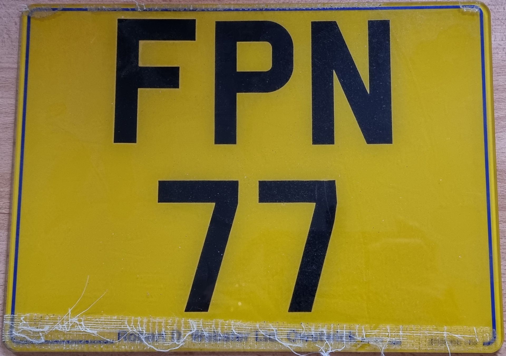 Registration number FPN 77, on retention, buyer to pay for the transfer.