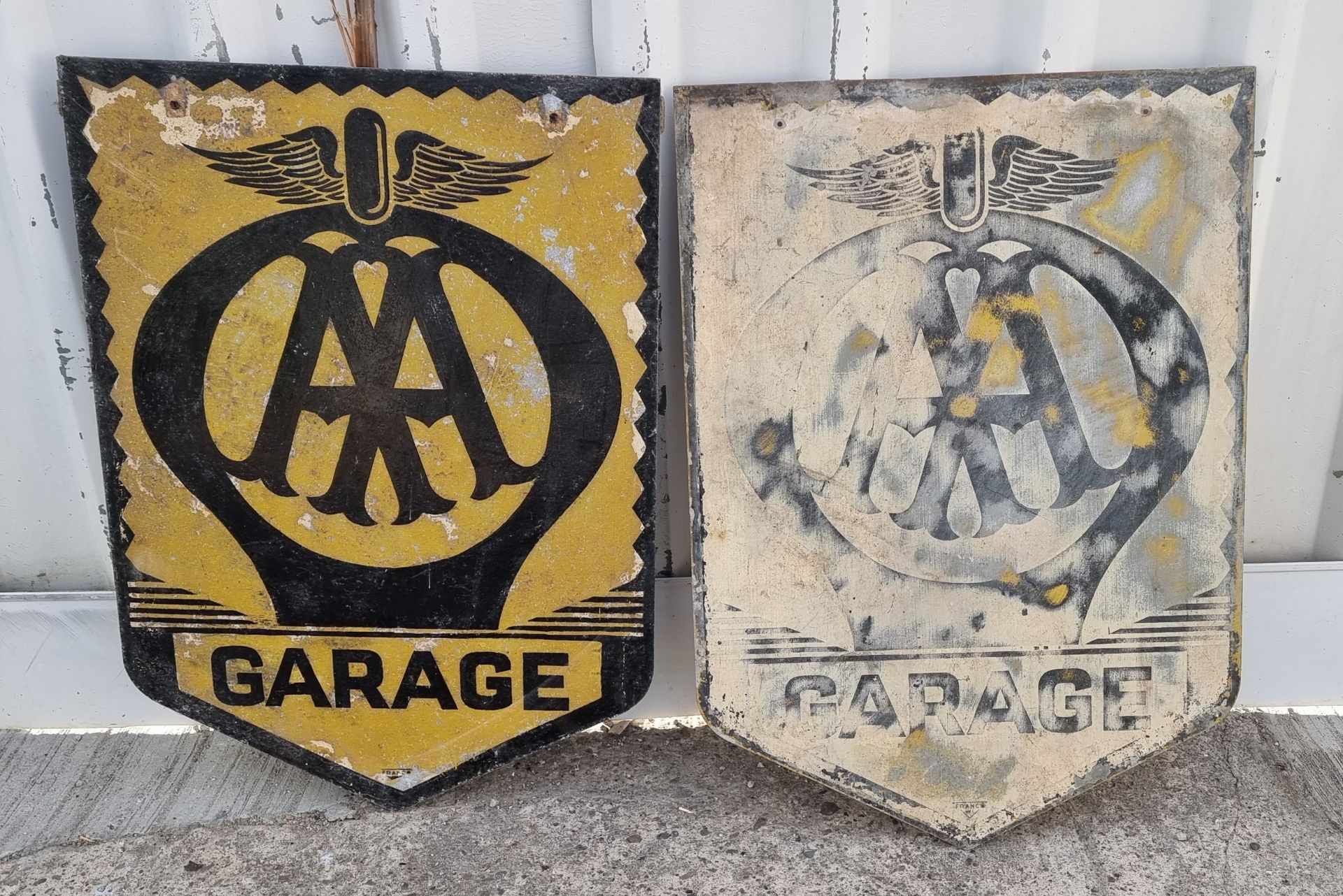 Two AA Garage vintage single sided advertising signs, from a double hanging sign lacking the
