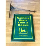 A John Deere wall mounted sign, double signed, Nothing Runs Like A Deere, with John Deere logo, 55cm