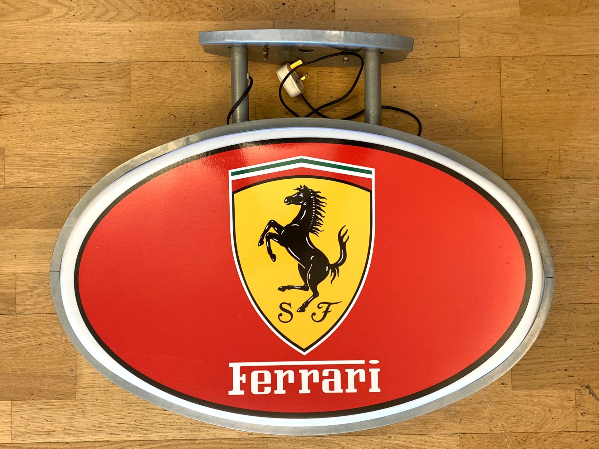 A Ferrari illuminated shop display sign, roof hanging, metal frame with plastic shell, depicting the - Image 2 of 4