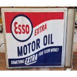 An Esso Extra Motor Oil Perspex double sided, wall mounted illuminated advertising sign, 72 x 65 x