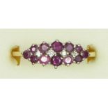 A 9ct gold ruby and diamond dress ring, P, 2.7gm