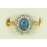 A 9ct gold blue topaz and diamond cluster ring K, 2.2gm