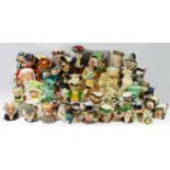 A large collection of mid 20th century Toby character jugs, vases, plates and figurines by Shorter &