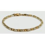 A 9ct two colour gold bracelet, 10gm, 18.5cm.