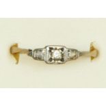 A 9ct gold and platinum diamond ring, shank broken, N, 1.2gm