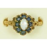 A 9ct gold opal and sapphire cluster ring, T, 2.5gn