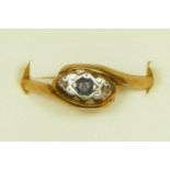 An 18ct gold sapphire and diamond chip three stone ring, N 1/2, worn shank, 1.6gm