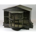 A Victorian painted birdcage of architectural dome shaped form. W60cm, D51cm, H42cm.