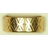 A 9ct gold textured wedding band, Q 1/2, 4.9gm