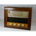 A mid 20th century Bush valve radio set, walnut veneer case. W50cm, H39cm, D18cm.