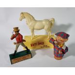 A White Horse Fine Old Whiskey display figure, in the form of a white horse on a plinth, 26cm, a