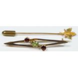A Canadian 14K three colour gold textured maple leaf stickpin, 0.9gm and an Edwardian 9ct rose