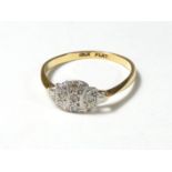 An Art Deco 18ct and plat diamond set panel ring, O, 2gm