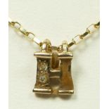 A 9ct gold and diamond letter H pendant, chain, 2.6gm